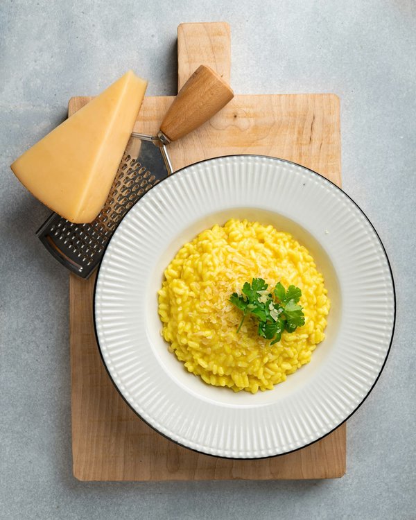 Quelle est la technique idéale pour préparer un risotto crémeux sans produits laitiers?